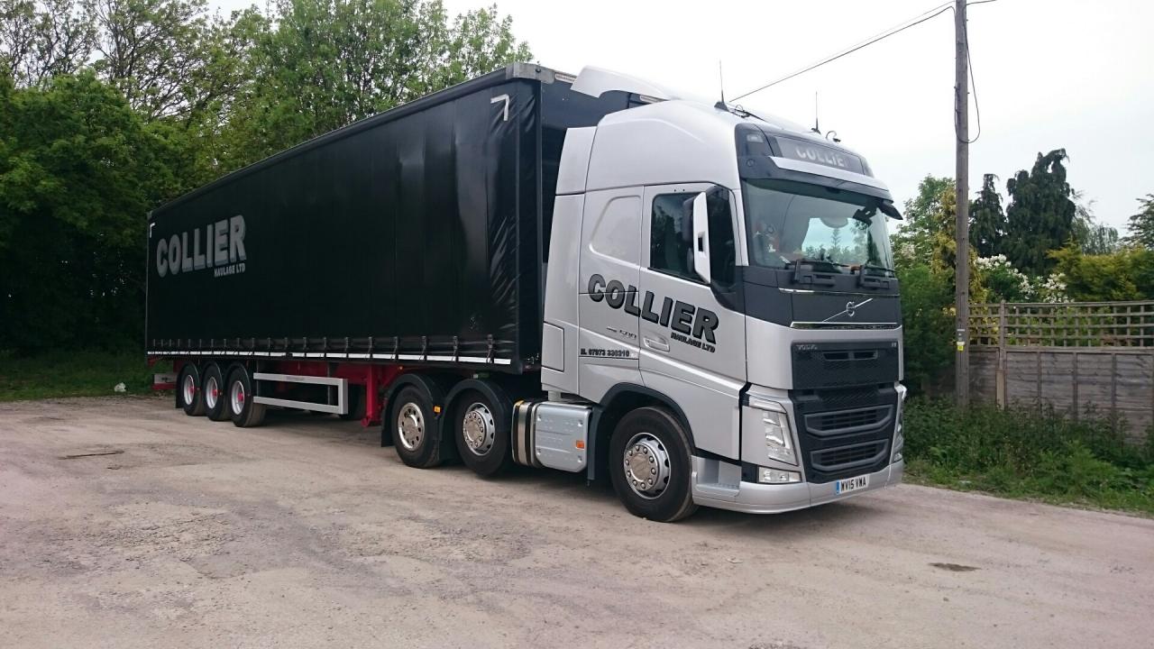 Collier Haulage truck carrying a palletised load